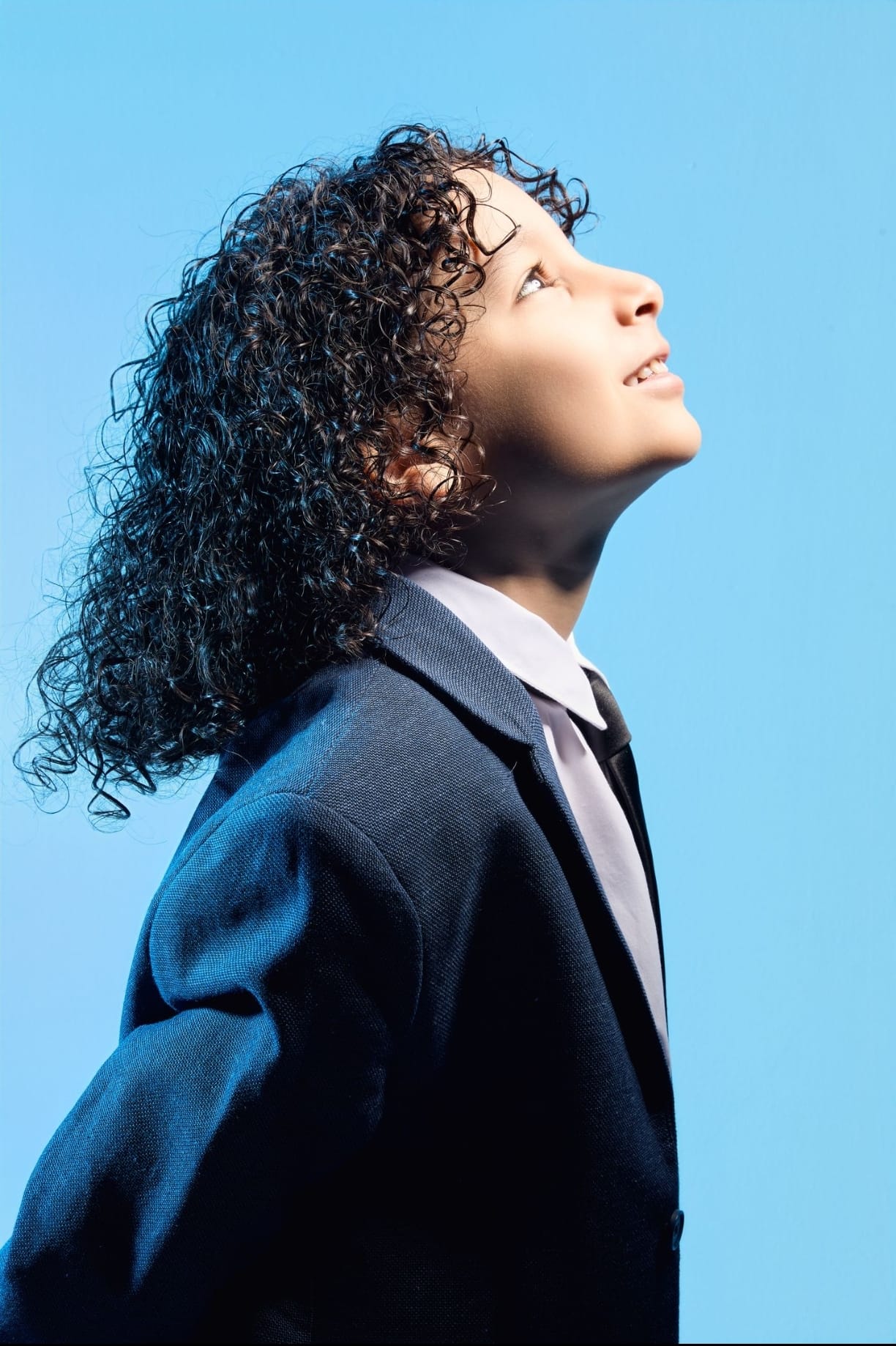 Editorial side profile in suit
